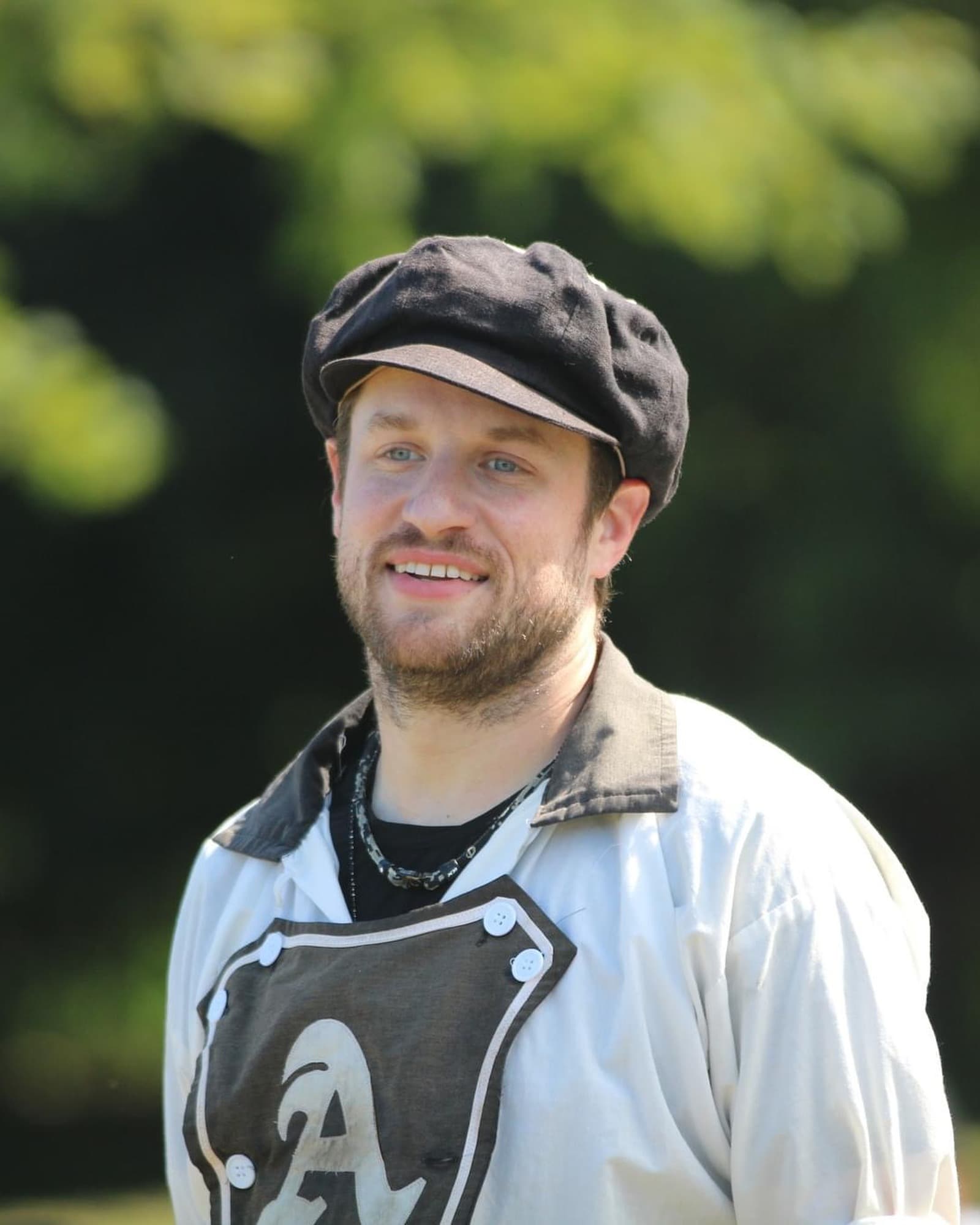 Eric in a vintage baseball uniform