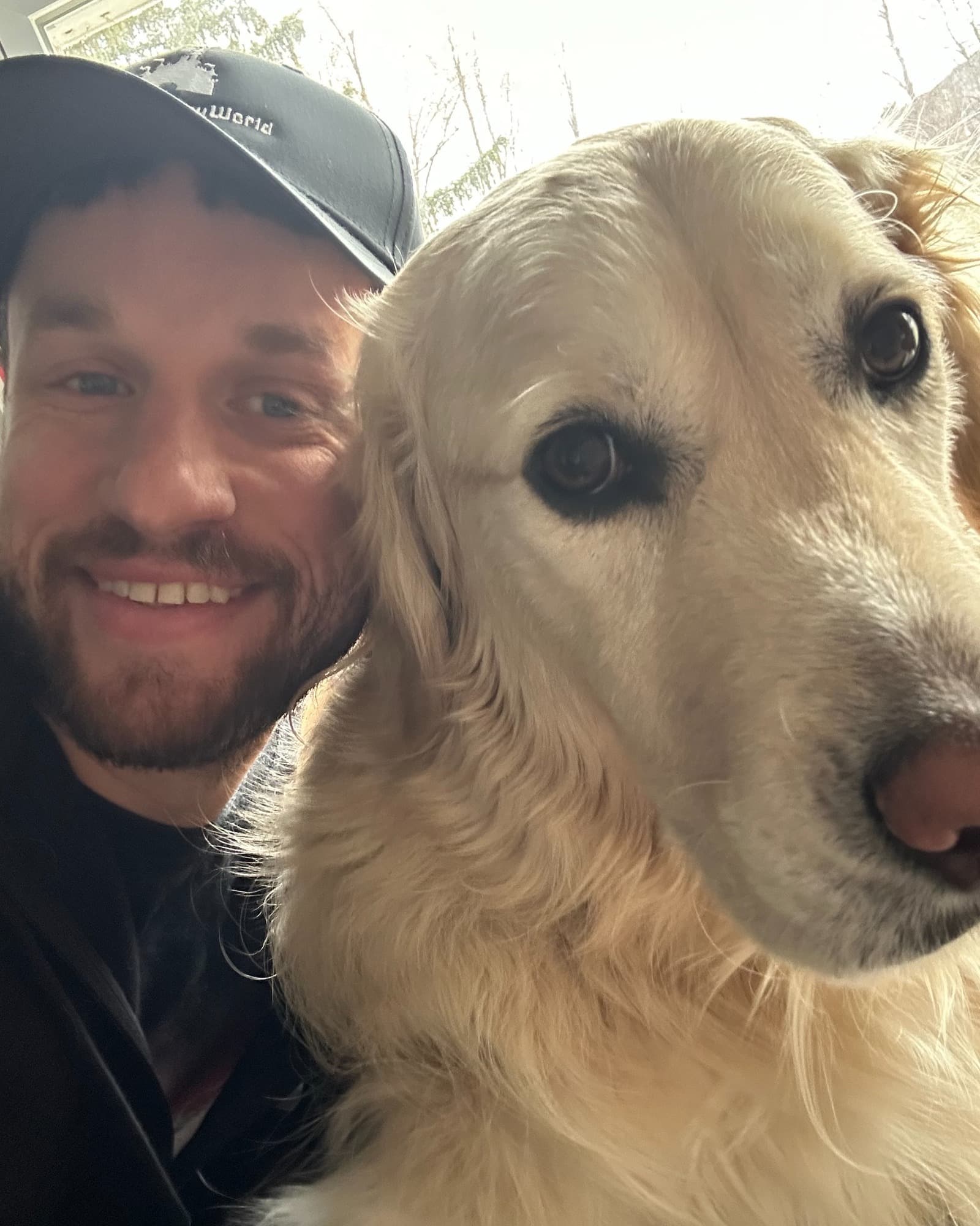 Eric and his golden retriever